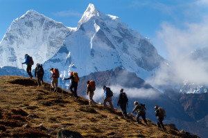 Soldiers to the Summit team trekking above Pherich in the shadow of Ama Dablam. Photo by Didrik Johnck